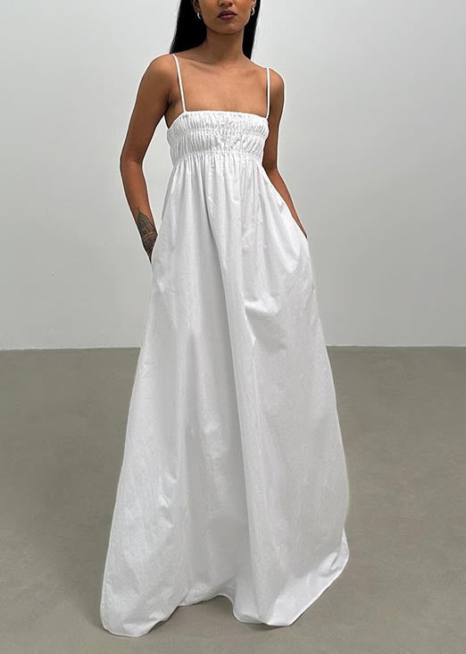 Robe à bretelles sans manches à dos ouvert de couleur unie
