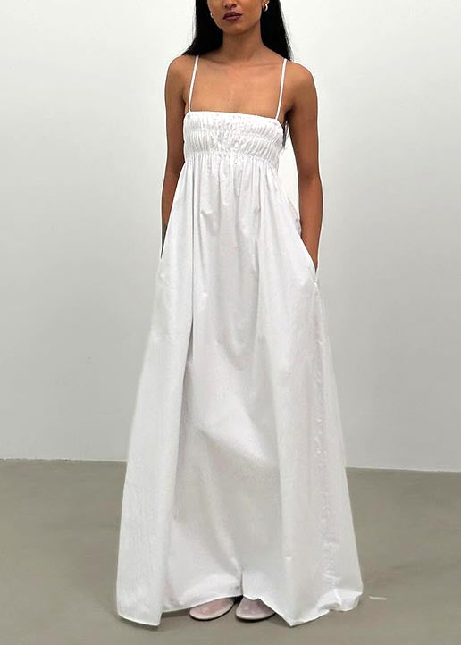 Robe à bretelles sans manches à dos ouvert de couleur unie