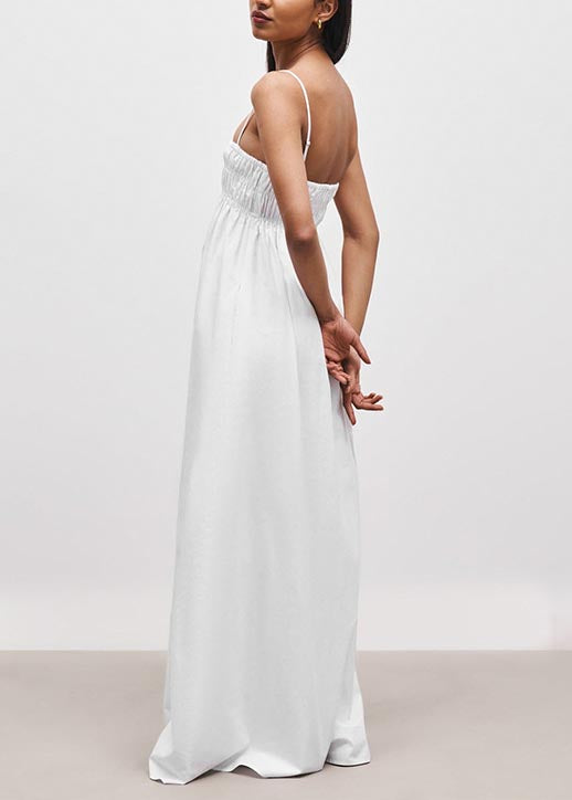 Robe à bretelles sans manches à dos ouvert de couleur unie