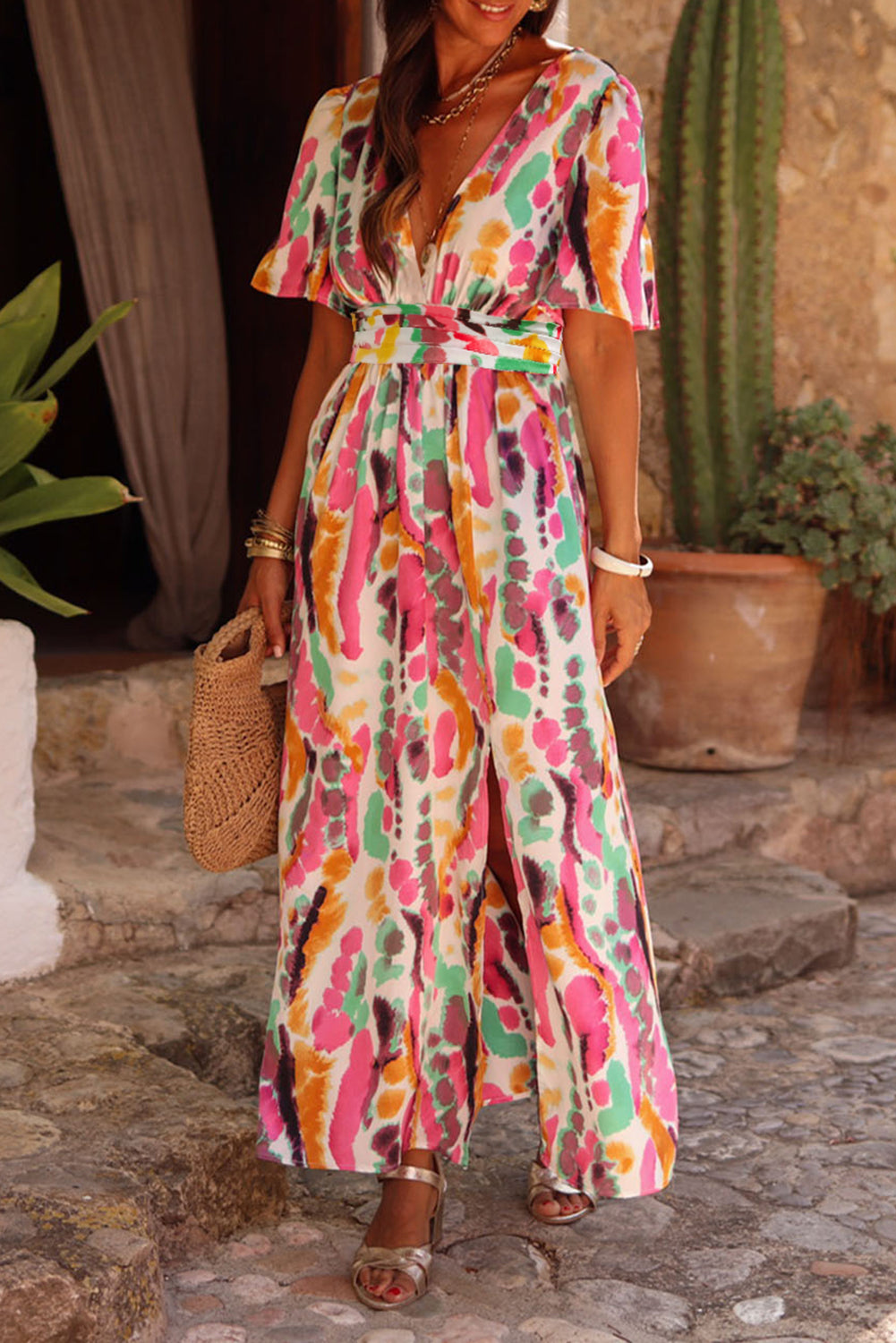 Robe longue rose à col en V et imprimé tie-dye style bohème