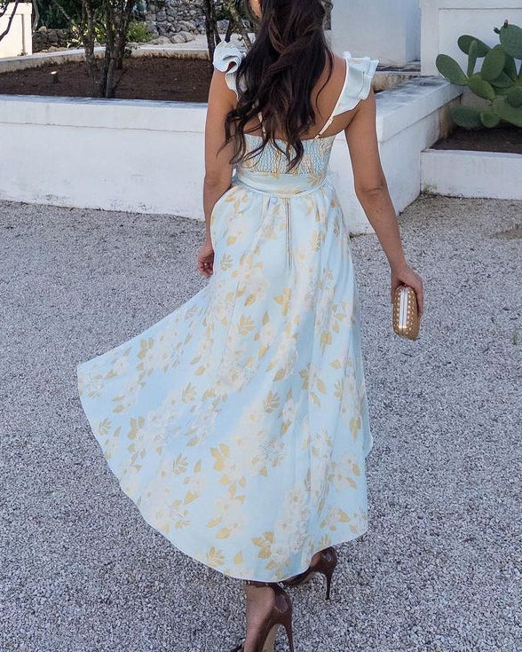 Robe imprimée à manches papillon et ceinture nouée à la taille