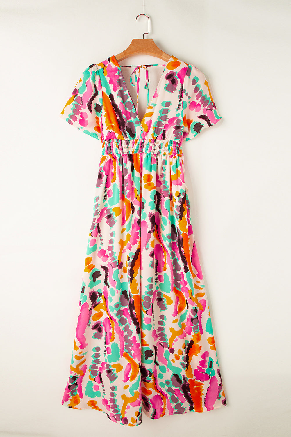 Robe longue rose à col en V et imprimé tie-dye style bohème