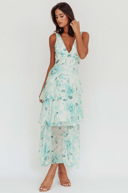 Robe mi-longue à bretelles et volants dans le dos
