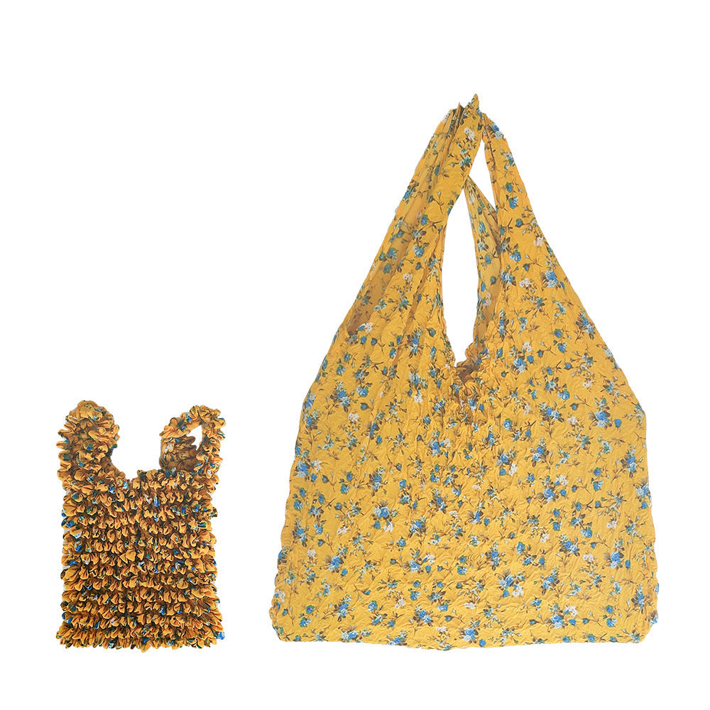 Sac rétractable à main à motif floral