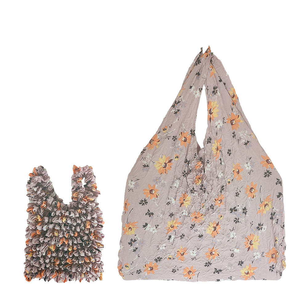Sac rétractable à main à motif floral