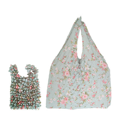 Sac rétractable à main à motif floral