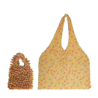 Sac rétractable à main à motif floral