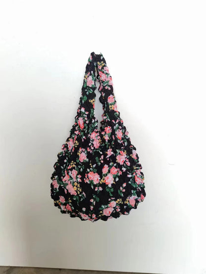 Sac rétractable à main à motif floral