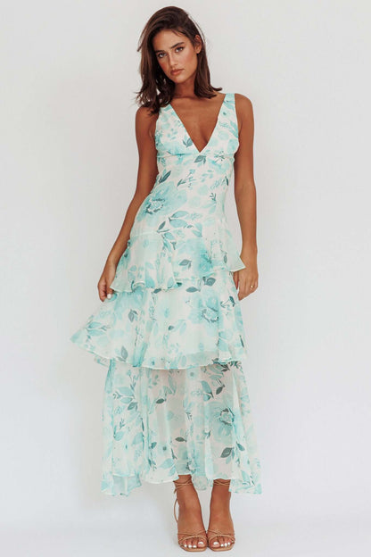 Robe mi-longue à bretelles et volants dans le dos